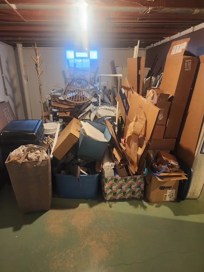 Roll-off dumpster container at job site for Construction Dumpster Rental in Falcon Heights